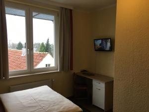 TV a/nebo společenská místnost v ubytování Hotel Sieme + 12 fotografií