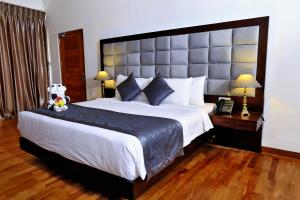 Letto o letti in una camera di Amaranthe Bay Resort & Spa