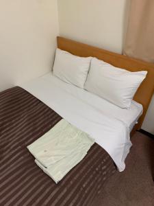 Postel nebo postele na pokoji v ubytování Matsue Urban Hotel Lake Inn