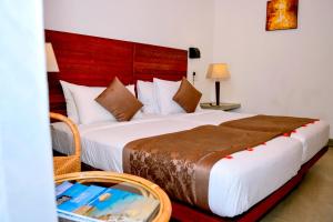 Letto o letti in una camera di Amaranthe Bay Resort & Spa