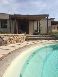 The swimming pool at or close to VILLA VISTA MARE INFINITY POOL