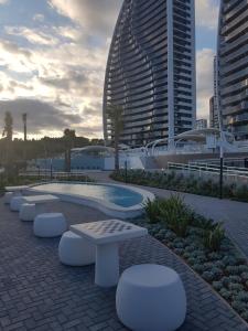 The swimming pool at or close to ROMERO APARTMENTS-SUNSET WAVES-BENIDORM