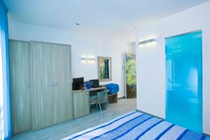Кровать или кровати в номере Hotel Napoleon