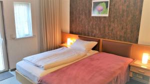 Postel nebo postele na pokoji v ubytování Gasthaus Köhlerhof