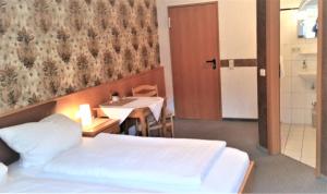 Postel nebo postele na pokoji v ubytování Gasthaus Köhlerhof