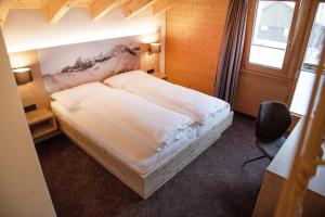 Letto o letti in una camera di Hotel Bergführer