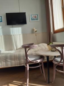 TV a/nebo společenská místnost v ubytování Nóra Apartman