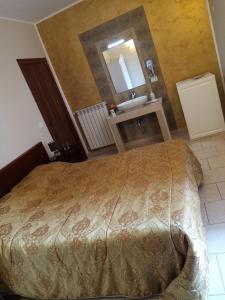 Postel nebo postele na pokoji v ubytování B&b De Mauro