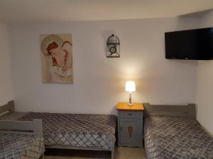 Postel nebo postele na pokoji v ubytování Kocisówka