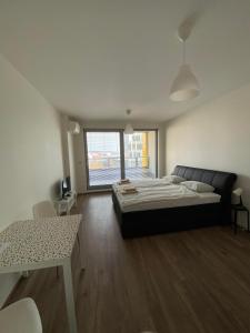 Voodi või voodid majutusasutuse Apartment David O2 Arena Prague toas