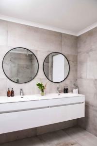 A bathroom at Bay Reflections Camps Bay Luxury Serviced Apartments
