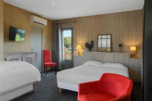 Krevet ili kreveti u jedinici u objektu Hotel Le Mas de Castel - Piscine chauffee