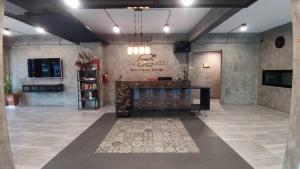 TV a/nebo společenská místnost v ubytování Phooree Boutique Hotel