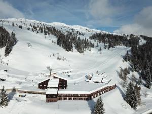 Casa Cucciolo Falcade durante l'inverno