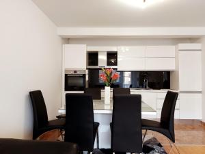 Kuchyň nebo kuchyňský kout v ubytování Deluxe Apartment MyPlace