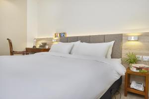 Postel nebo postele na pokoji v ubytování Hotel Z