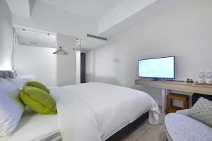 Postel nebo postele na pokoji v ubytování Hotel Z