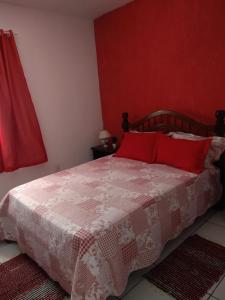 เตียงในห้องที่ Casa de Praia em Arraial Cabo-RJ