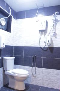 Koupelna v ubytování Highlanders Hotel