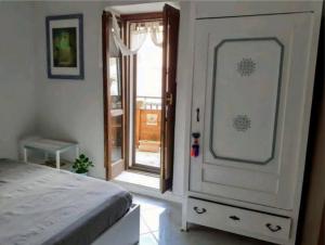 Postel nebo postele na pokoji v ubytování LE ORIGINI casa in borgo tipico lucano