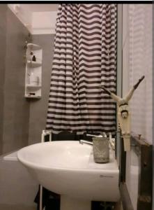 Koupelna v ubytování LE ORIGINI casa in borgo tipico lucano + 26 fotografií