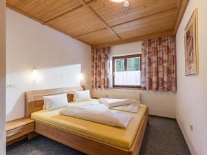 Łóżko lub łóżka w pokoju w obiekcie Appartementhaus Talwinkel