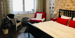 Postel nebo postele na pokoji v ubytování Apartments Centrum