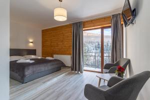 Konopka Forest Home & SPA客房内的一张或多张床位