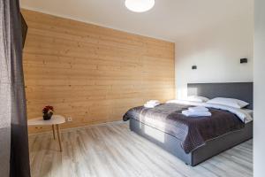 Konopka Forest Home & SPA客房内的一张或多张床位