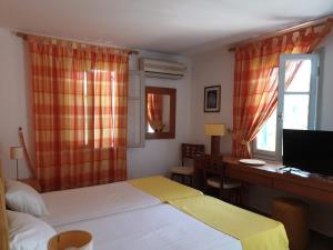 Postel nebo postele na pokoji v ubytování Villa Eleni