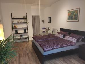 Postel nebo postele na pokoji v ubytování Apartment Philosophenviertel