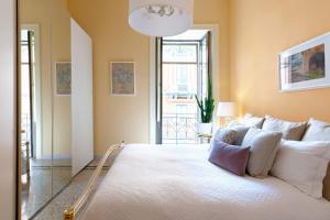 Postel nebo postele na pokoji v ubytování Starhost - CHEZ MAMIE