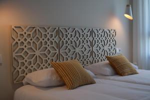 Posteľ alebo postele v izbe v ubytovaní GRETA PLAYA PANORAMA APARTAMENTO by AlohaMalaga + 28 fotografií