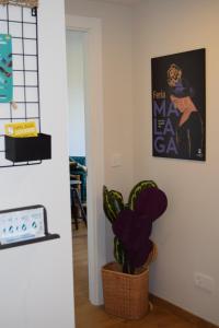 Televízia a/alebo spoločenská miestnosť v ubytovaní GRETA PLAYA PANORAMA APARTAMENTO by AlohaMalaga