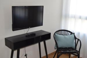 Televízia a/alebo spoločenská miestnosť v ubytovaní GRETA PLAYA PANORAMA APARTAMENTO by AlohaMalaga