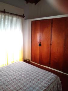 Duplex en San Bernardo a dos cuadras de la playa客房内的一张或多张床位