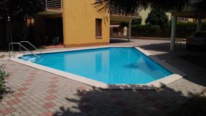 Bazén v ubytování Jenny apartman Siófok nebo v jeho okolí