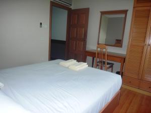 Krevet ili kreveti u jedinici u objektu Jinhold Service Apartment Miri