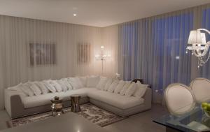 Uma área de estar em Yoo Punta del Este - Rental Club Apartments