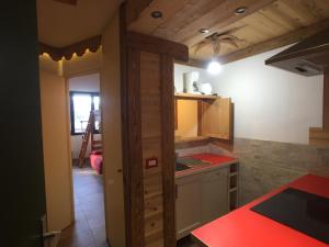 Ένα ή περισσότερα κρεβάτια σε δωμάτιο στο Chamonix Holiday Cromotherapy Apartment 1