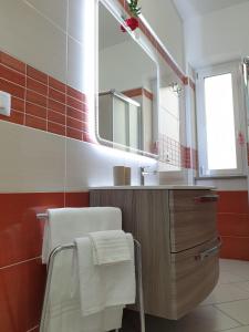 Kúpeľňa v ubytovaní Casetta Costabile