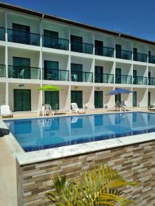 Bazén v ubytování Pousada Sky Beach Flat nebo v jeho okolí