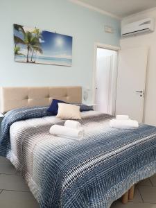 Una cama o camas en una habitación de Casetta Costabile