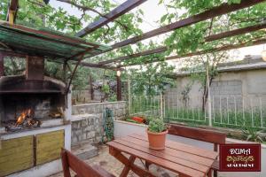 Oprema za žar, na voljo gostom v apartmaju