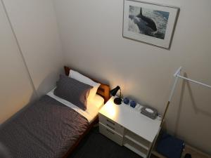 Postel nebo postele na pokoji v ubytování Oceanic Hostel
