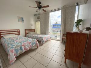 Postel nebo postele na pokoji v ubytování Paradigm Villa Dorado + 37 fotografií
