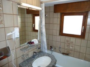 Ванная комната в Hotel Monte-Moro