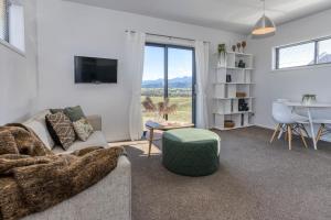 אזור ישיבה ב-Tasman View Accommodation