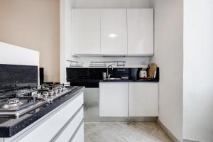 A kitchen or kitchenette at Vatican Andrea's house