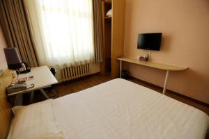 TV a/nebo společenská místnost v ubytování Beijing Sicily Hotel
